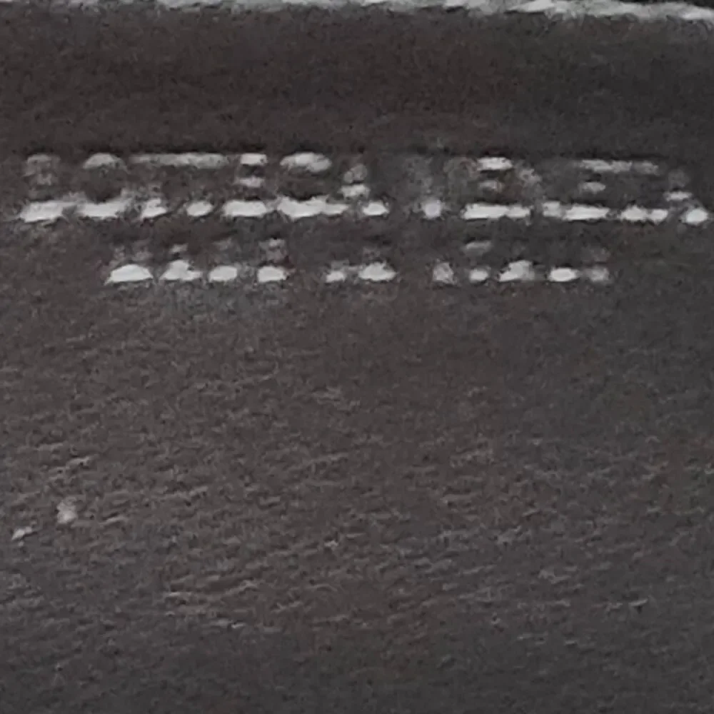 Bottega Veneta Intrecciato Zip-Around Long Wallet.